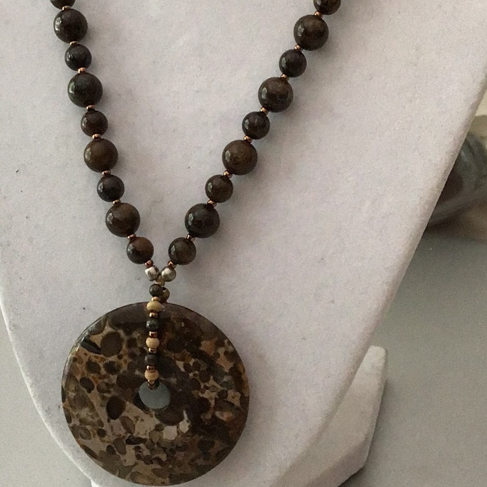 Handmade Natural Turritella/fossil Necklace with Donut Pendant. 18”
2” pendant - Picture 3 of 7